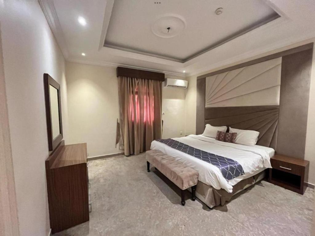 Postel nebo postele na pokoji v ubytování شقق السلامة العائلية - Al Salamh Family Apartments