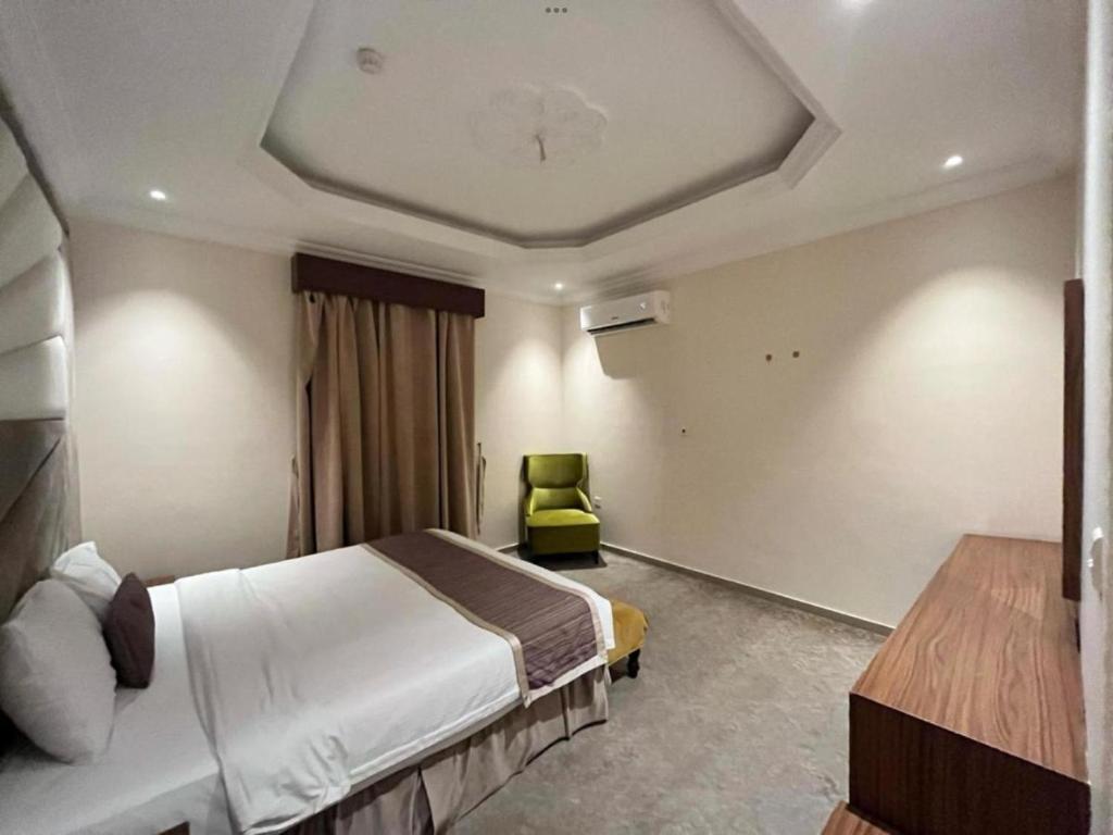Postel nebo postele na pokoji v ubytování شقق السلامة العائلية - Al Salamh Family Apartments