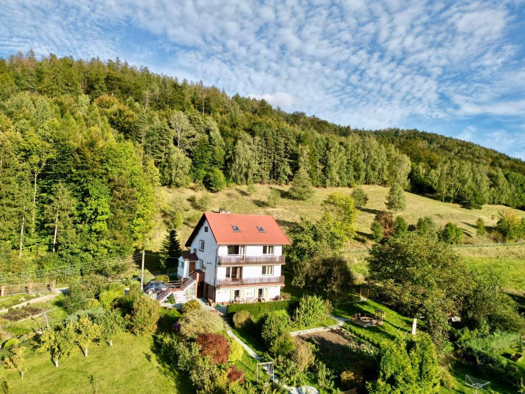 an aerial view of a house on a hill at Dolina Piekielnicy in Przygórze