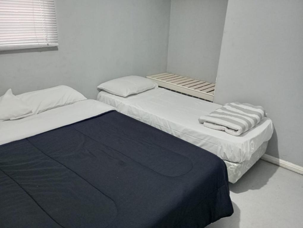 Postel nebo postele na pokoji v ubytování Apart HOTEL RUTA 66