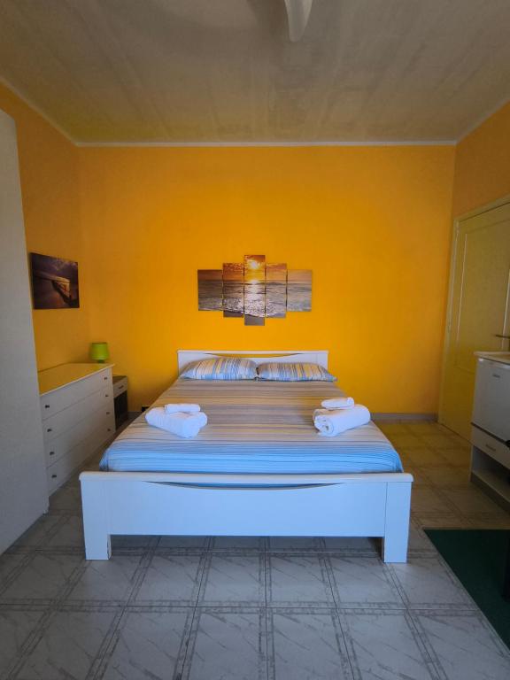 Postel nebo postele na pokoji v ubytování Onda blu