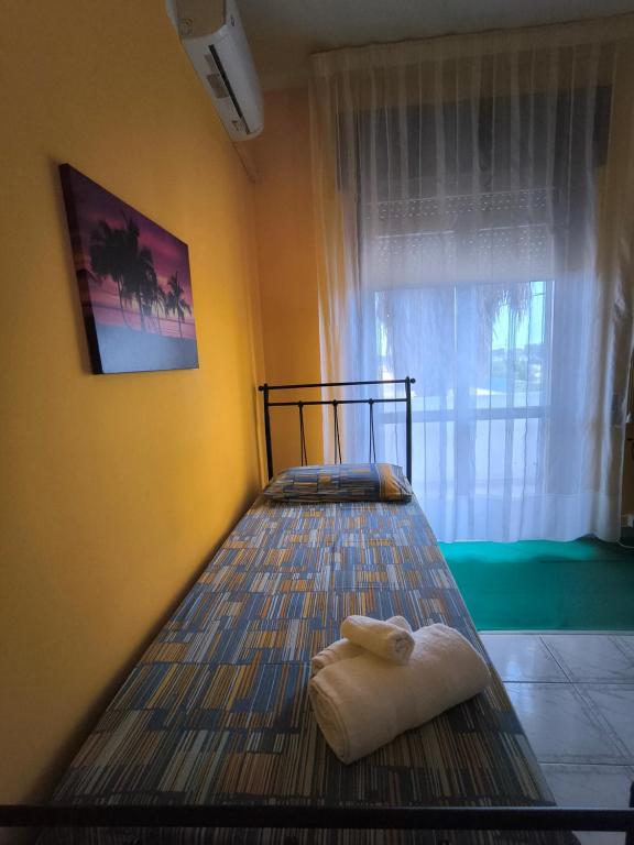 Postel nebo postele na pokoji v ubytování Onda blu