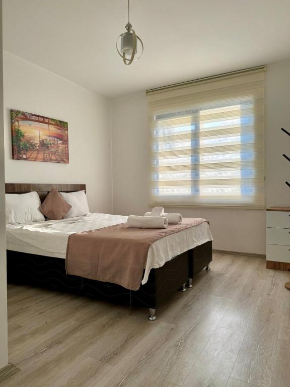 Postel nebo postele na pokoji v ubytování Casa Rosa Luxury Villa w heated Pool