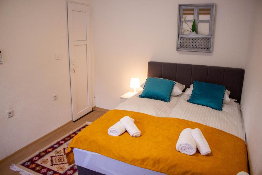 Postel nebo postele na pokoji v ubytování Bosanska avlija