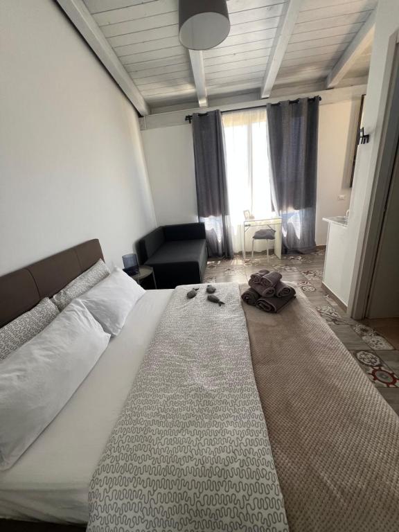 Postel nebo postele na pokoji v ubytování Cozzo Spadaro B&B
