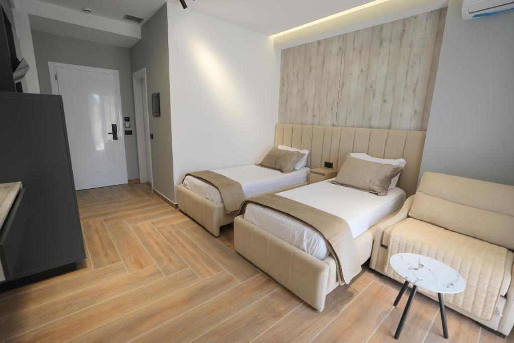 Postel nebo postele na pokoji v ubytování Apartments Romario