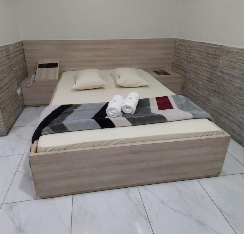 Postel nebo postele na pokoji v ubytování Hotel Caliente