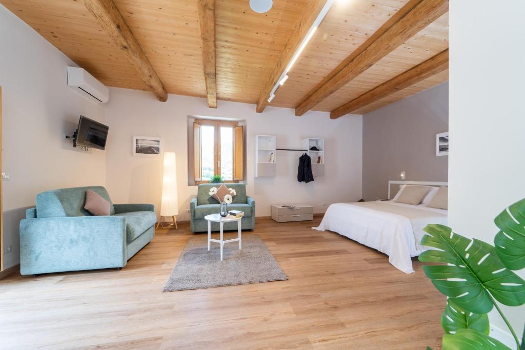 Postel nebo postele na pokoji v ubytování Le vie del Borgo