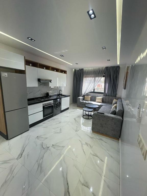 Kuchyň nebo kuchyňský kout v ubytování Oumaira Residence Azla-Tetouan