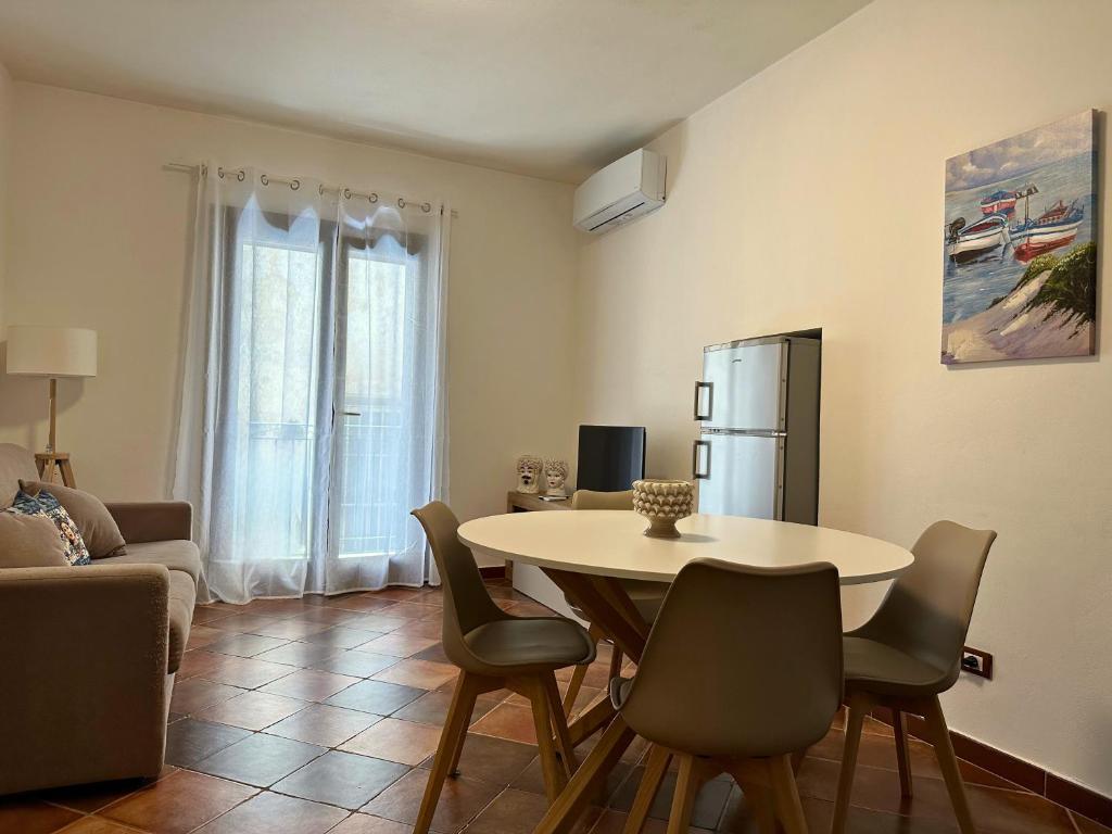 Televízia a/alebo spoločenská miestnosť v ubytovaní Appartamenti-Residence Al Massimo