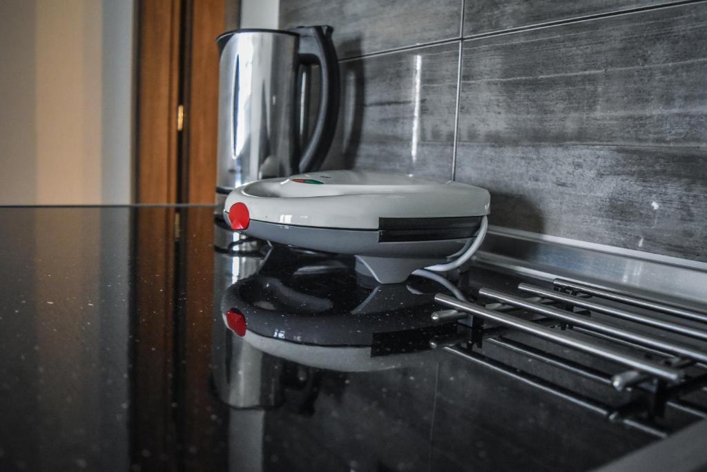 Kuchyň nebo kuchyňský kout v ubytování Mirsini Apartments