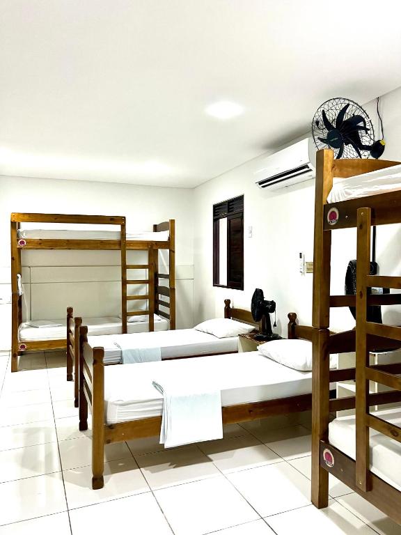 Postel nebo postele na pokoji v ubytování A Oca Hostel Bar