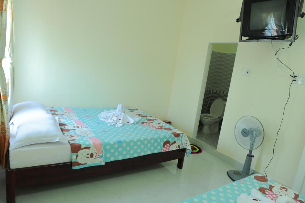 Postel nebo postele na pokoji v ubytování Thanh An 3 Guesthouse