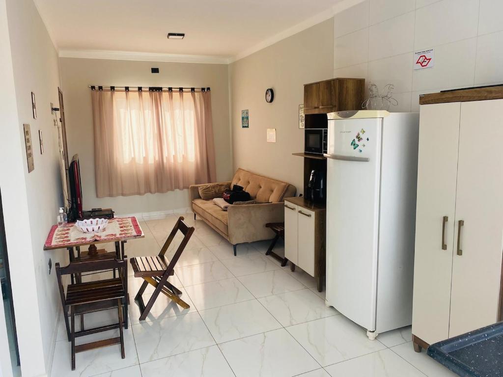 Kuchyň nebo kuchyňský kout v ubytování Casa Inteira Aconchegante com Garagem