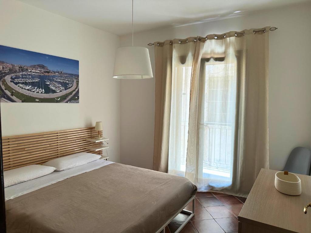 Posteľ alebo postele v izbe v ubytovaní Appartamenti-Residence Al Massimo