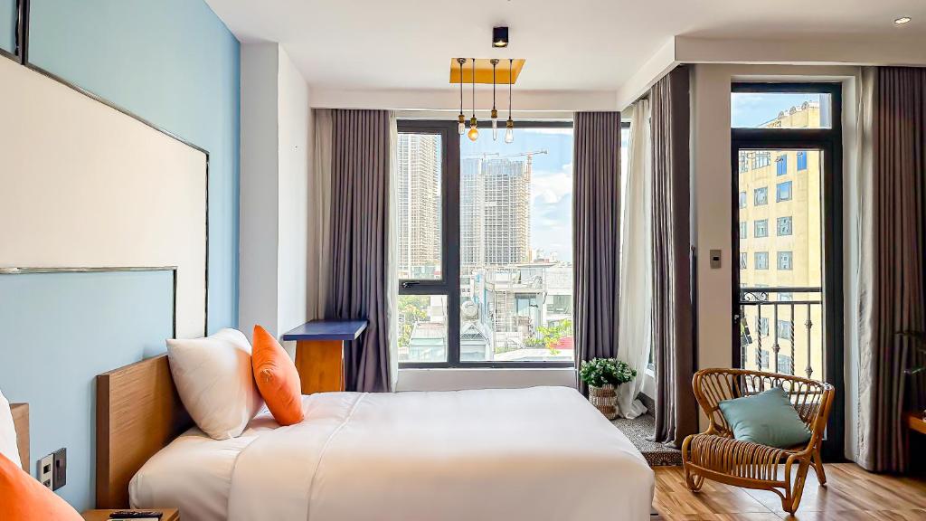Giường trong phòng chung tại Sea Vista Boutique Hotel & Apartment