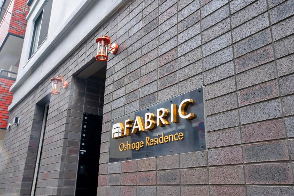 Chứng chỉ, giải thưởng, bảng hiệu hoặc các tài liệu khác trưng bày tại Uhome Fabric Hotel