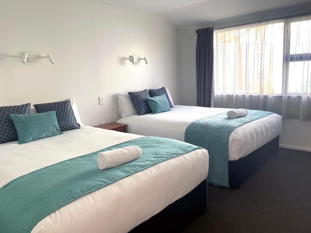Letto o letti in una camera di Kingston TOP 10 Holiday Park