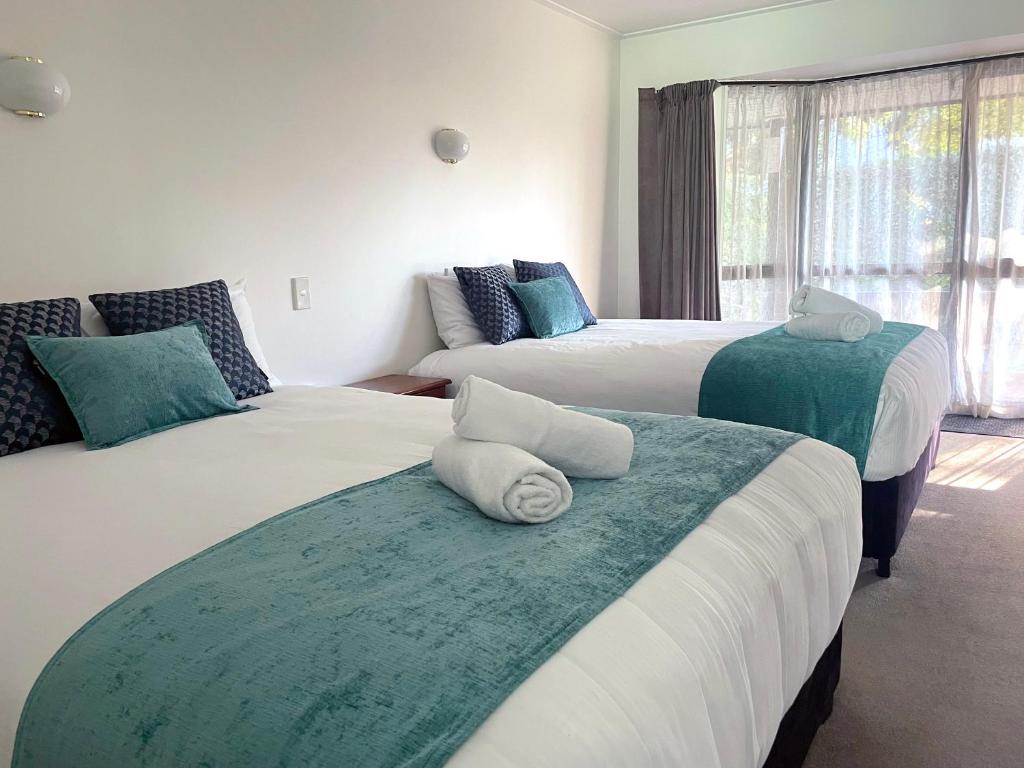 Letto o letti in una camera di Kingston TOP 10 Holiday Park