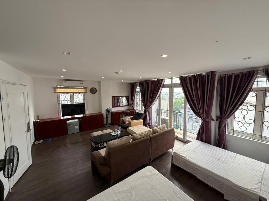 Postel nebo postele na pokoji v ubytování New Amely Hotel