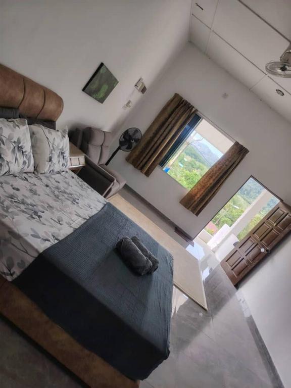 Postel nebo postele na pokoji v ubytování National Park Belebar Studio - Kuala Tahan