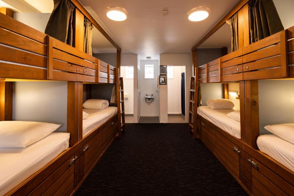 Postel nebo postele na pokoji v ubytování Haka House Taupo