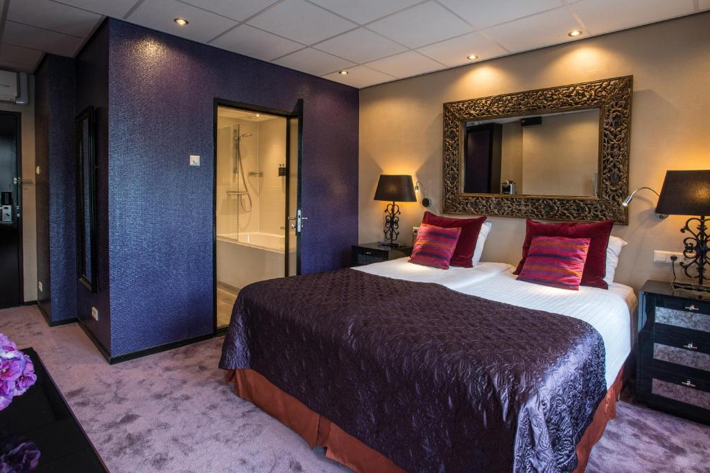 Postel nebo postele na pokoji v ubytování Hotel Sebastians