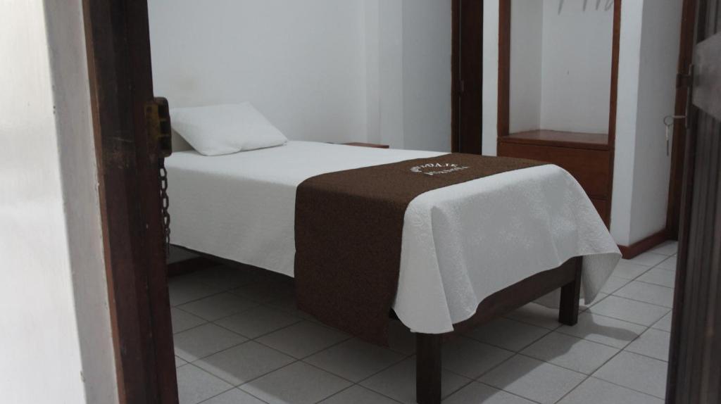 Postel nebo postele na pokoji v ubytování Hospedaje Juanita