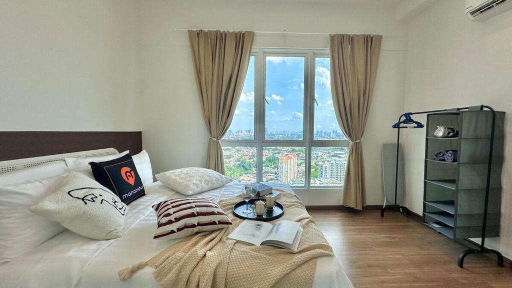 Ένα ή περισσότερα κρεβάτια σε δωμάτιο στο 121 Residences by manatidur Near One Utama