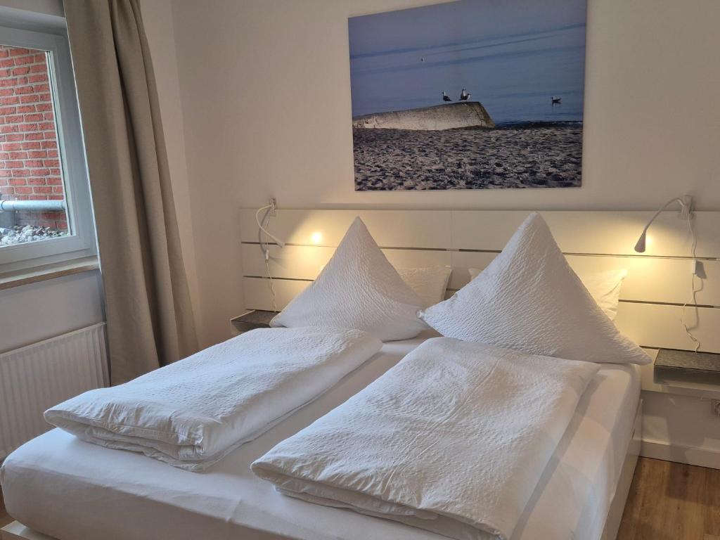 Postel nebo postele na pokoji v ubytování FeWo Machedanz strandnah Timmendorfer Strand