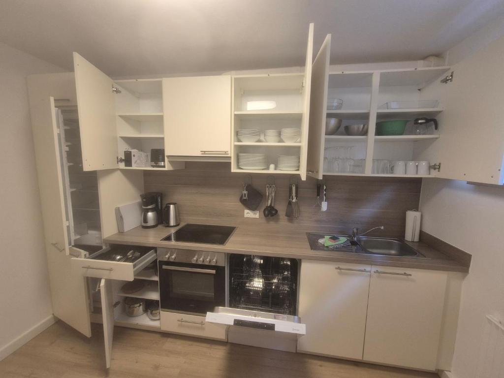Kuchyň nebo kuchyňský kout v ubytování FeWo Machedanz strandnah Timmendorfer Strand