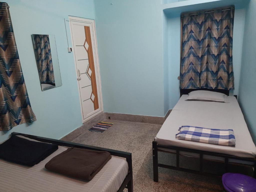 Postel nebo postele na pokoji v ubytování Bubble Beds