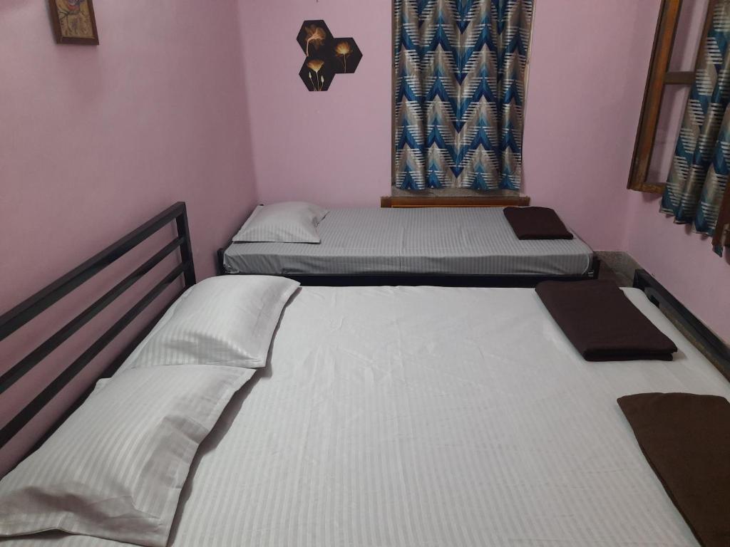 Postel nebo postele na pokoji v ubytování Bubble Beds