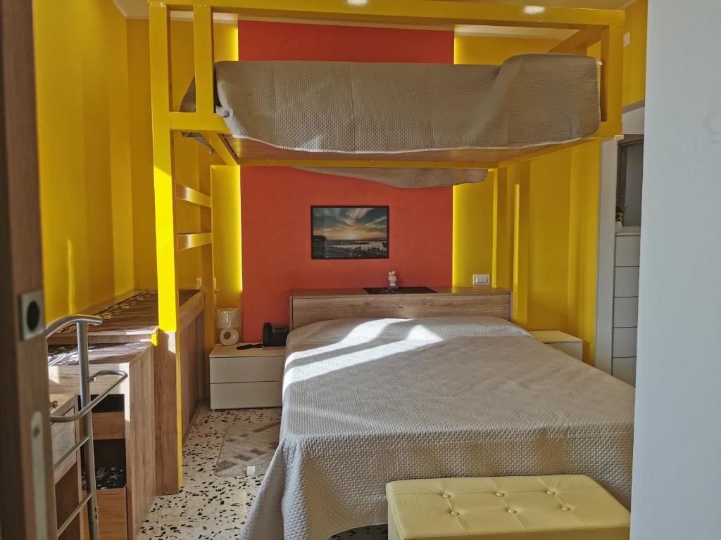 Postel nebo postele na pokoji v ubytování Sailorsroom