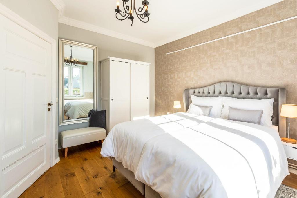 Postel nebo postele na pokoji v ubytování Hotel Villa Wahnfried Thiessow