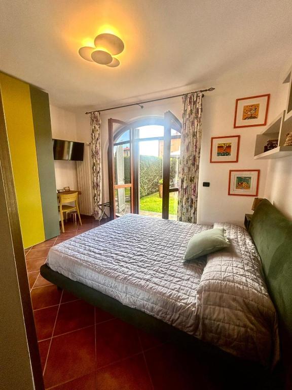 Łóżko lub łóżka w pokoju w obiekcie Casa Paola nel Chianti