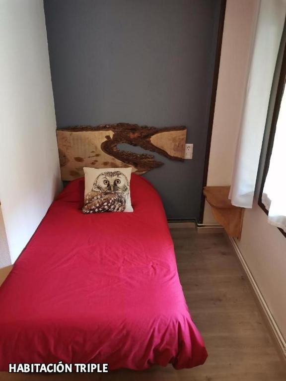 Postel nebo postele na pokoji v ubytování Hostal Rural Sant Climent