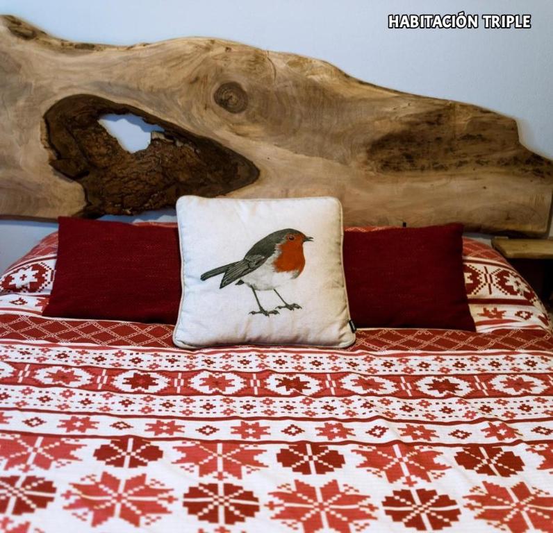 Postel nebo postele na pokoji v ubytování Hostal Rural Sant Climent
