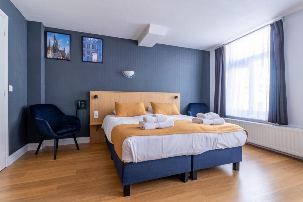 Postel nebo postele na pokoji v ubytování Hotel Montovani