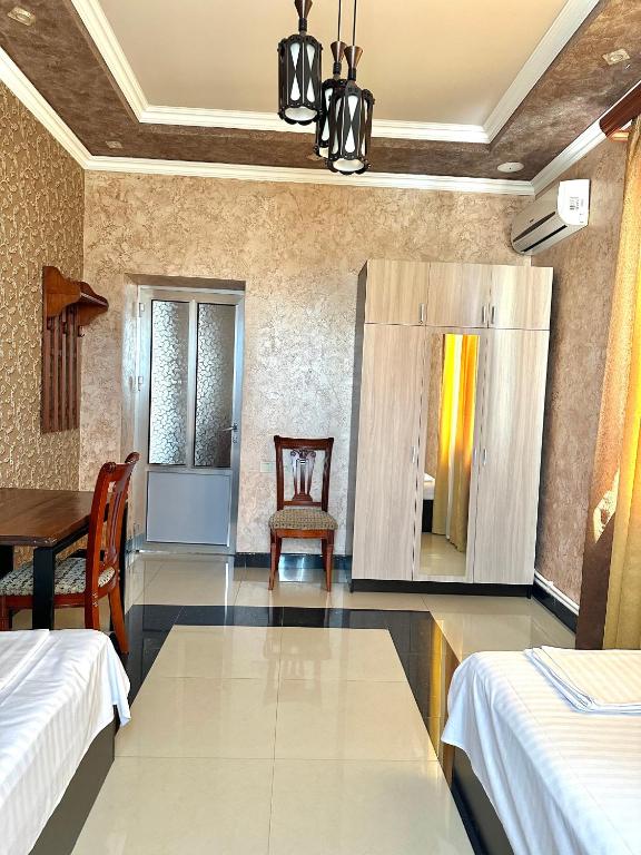 Postel nebo postele na pokoji v ubytování KangAr guest house