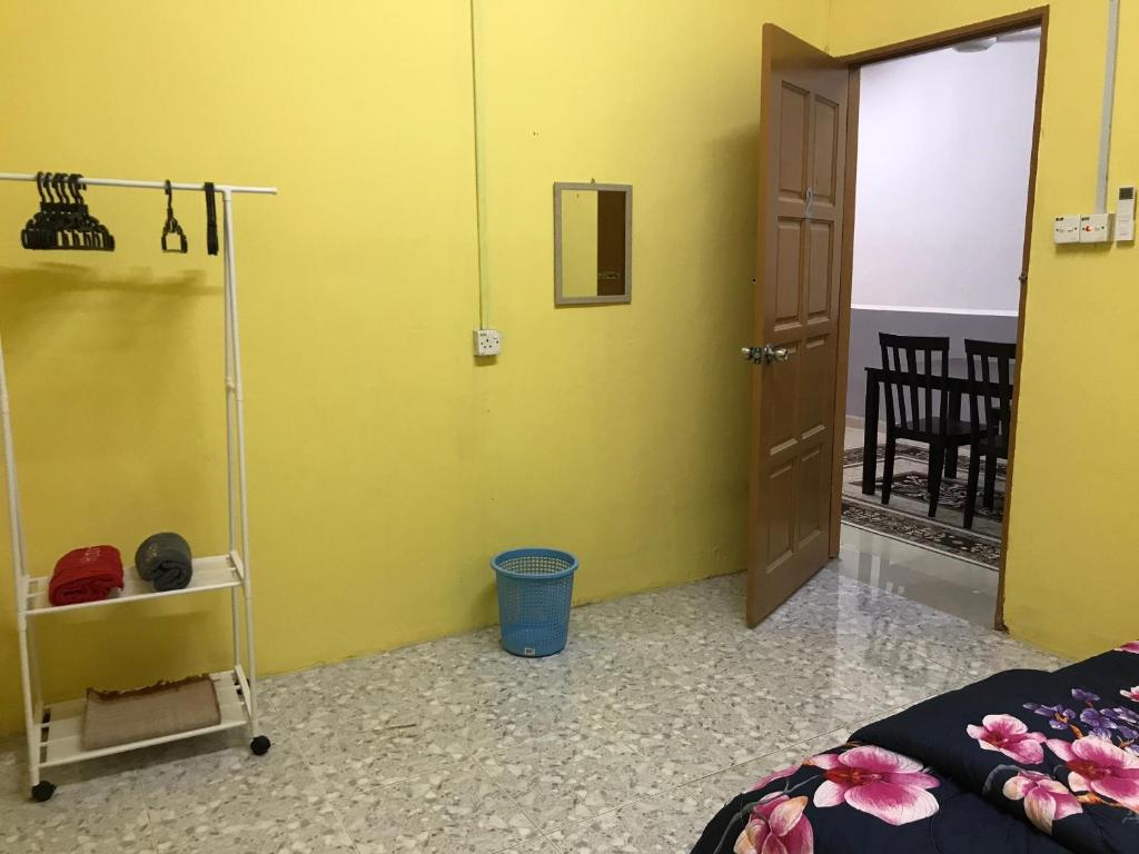 Postel nebo postele na pokoji v ubytování Homestay D'Besut