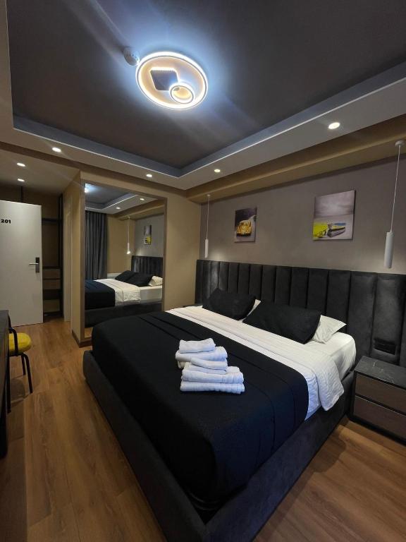 Postel nebo postele na pokoji v ubytování Peaky Hotel
