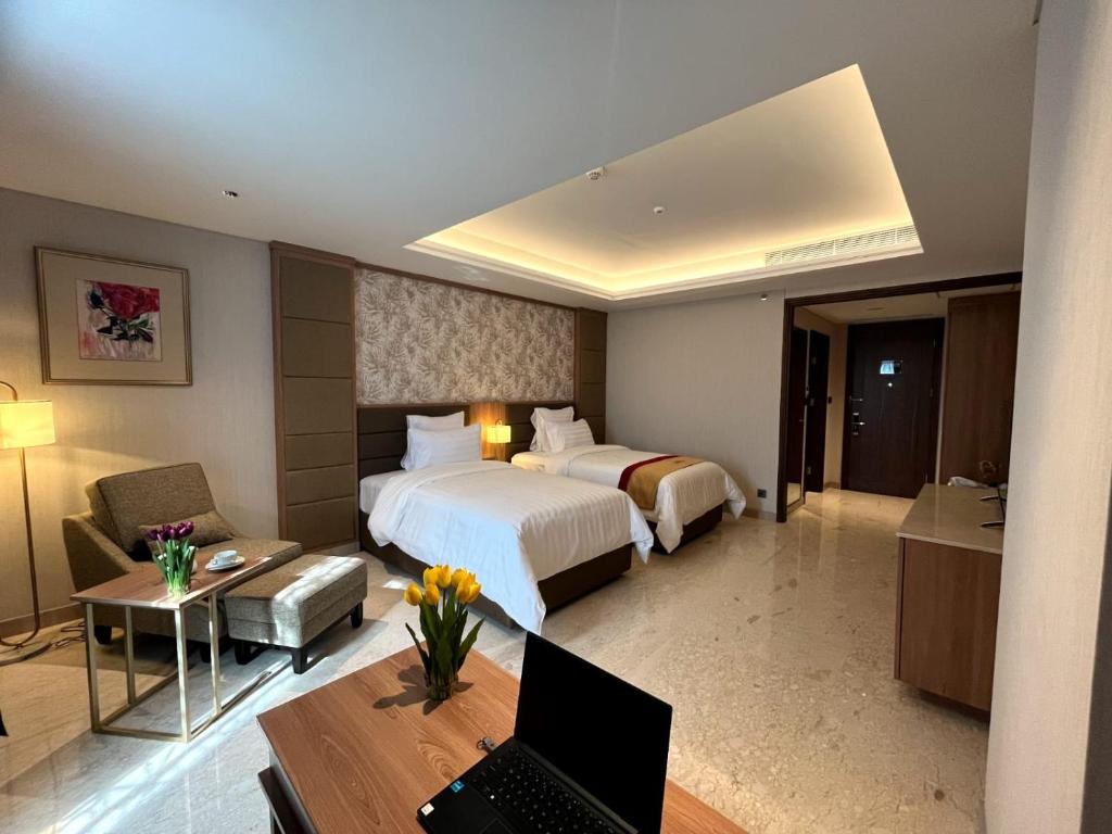 Grand Travello Hotel Bekasi - Chambre Lits Jumeaux De Luxe