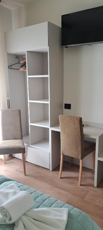 Postel nebo postele na pokoji v ubytování Garnì Casa Rabagno