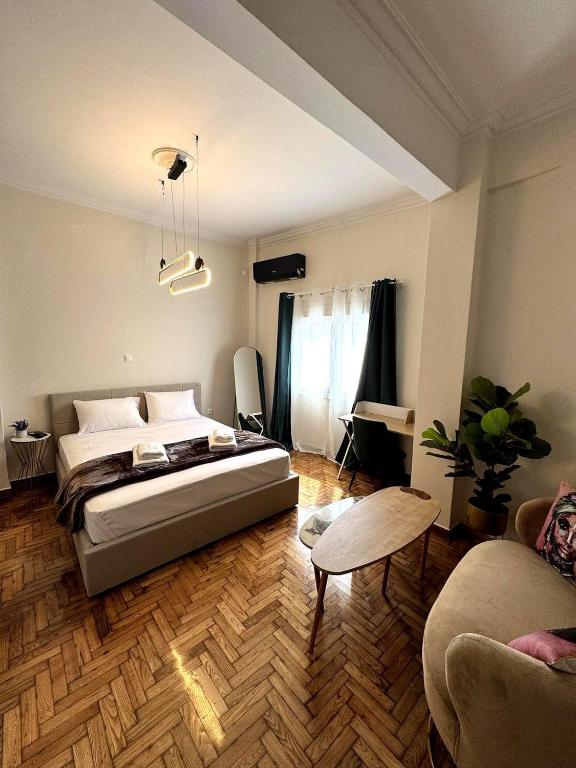 Katil atau katil-katil dalam bilik di Athenian Stay Chara's 2 Apartment