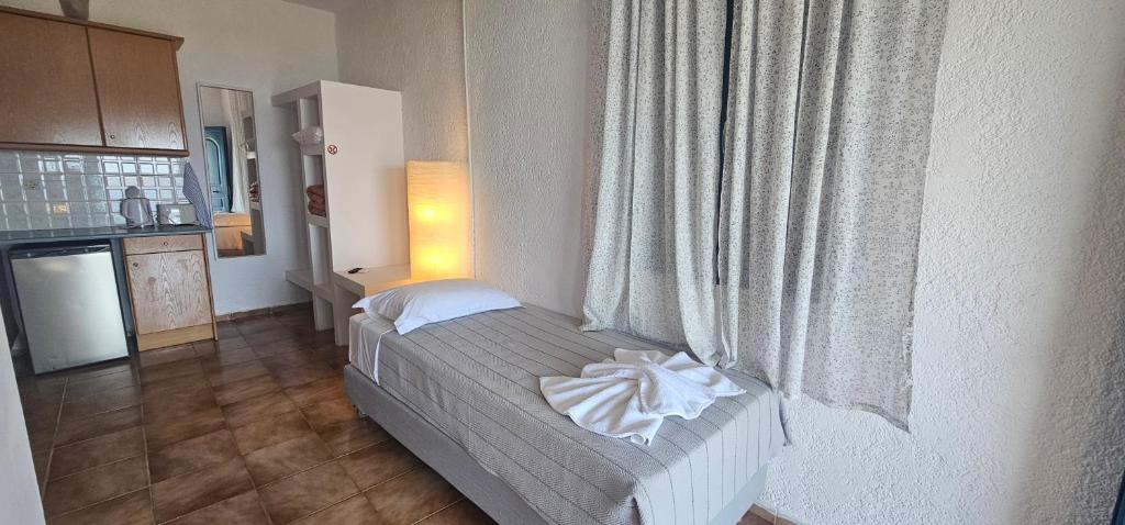 Kuchyň nebo kuchyňský kout v ubytování Metaxatos Apartments