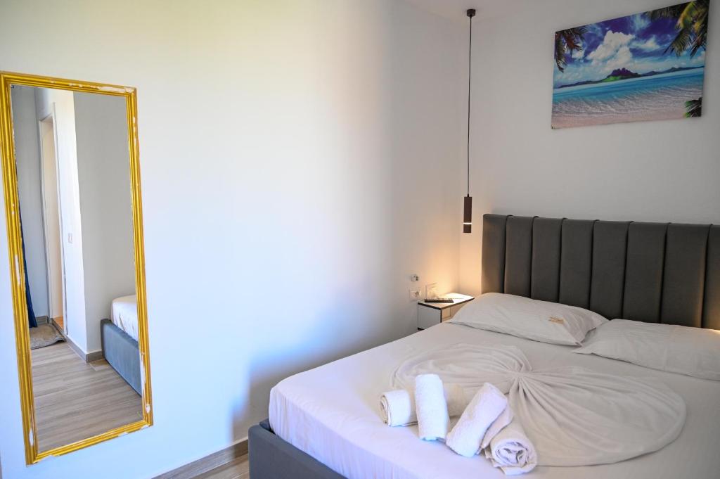 Uma cama ou camas num quarto em Hotel Vila AARON