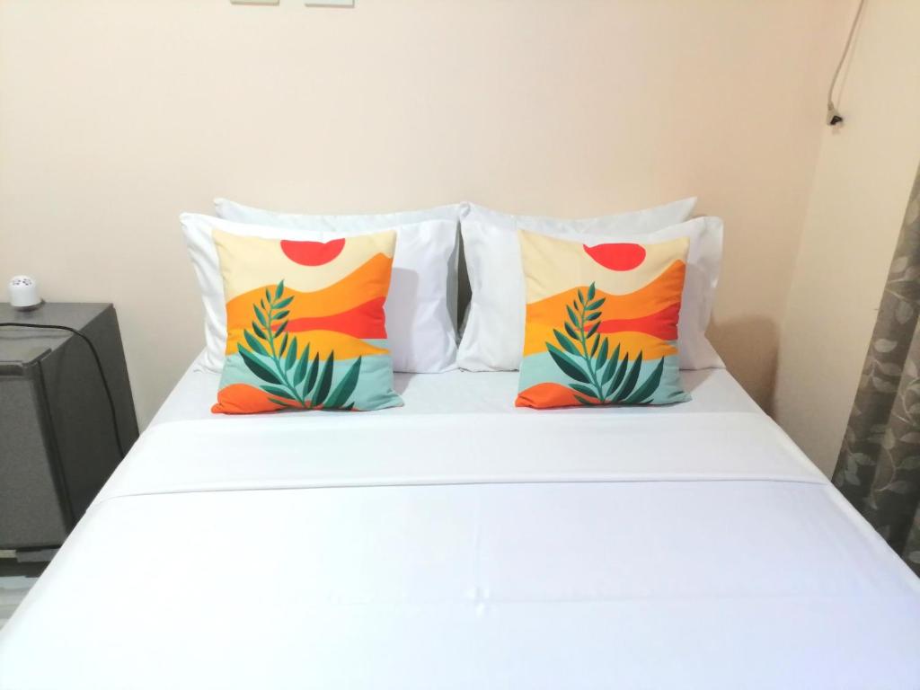 Postel nebo postele na pokoji v ubytování Solsken Guest House
