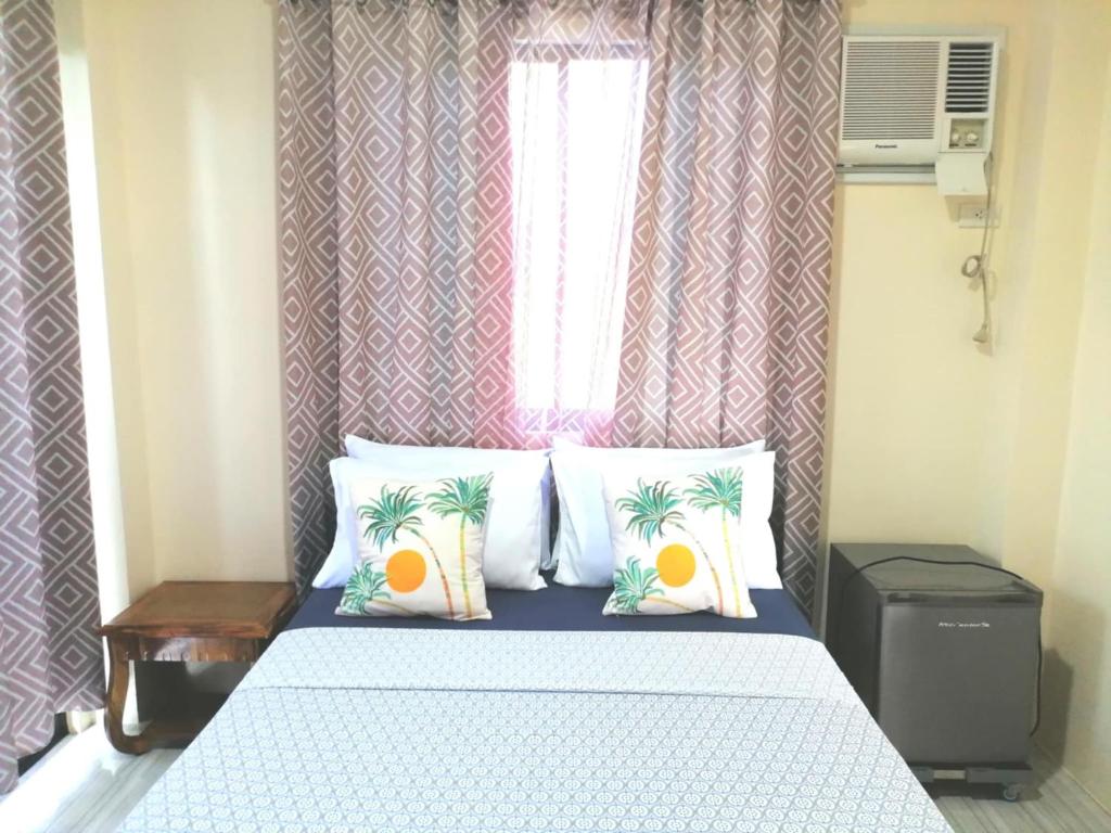 Postel nebo postele na pokoji v ubytování Solsken Guest House