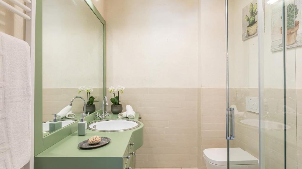 Kúpeľňa v ubytovaní Torre Ginestre 12, Emma Villas